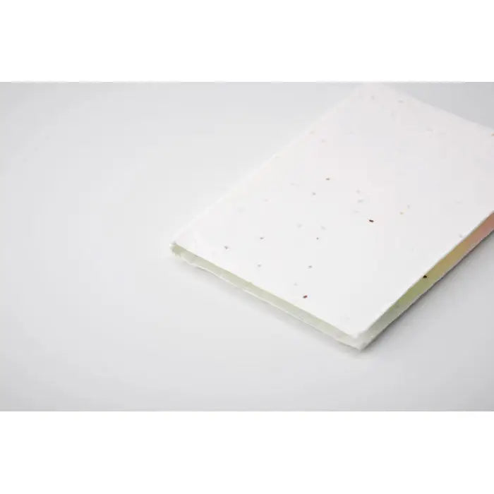 Bloc de note lipicioase din hartie cu seminte alb cu textura moale si pete usoare pentru notite ecologice