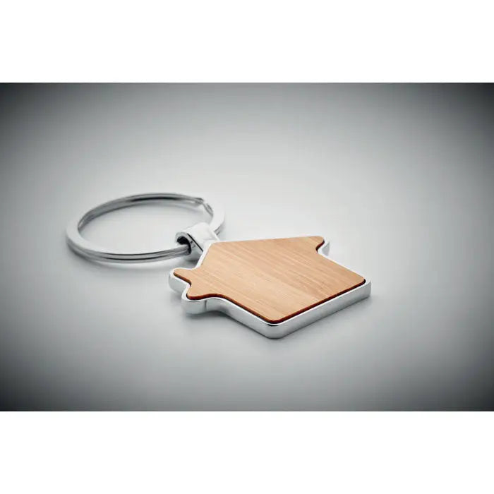 Breloc casa din metal bambus cu centru natural din lemn si margini din metal argintiu slefuit