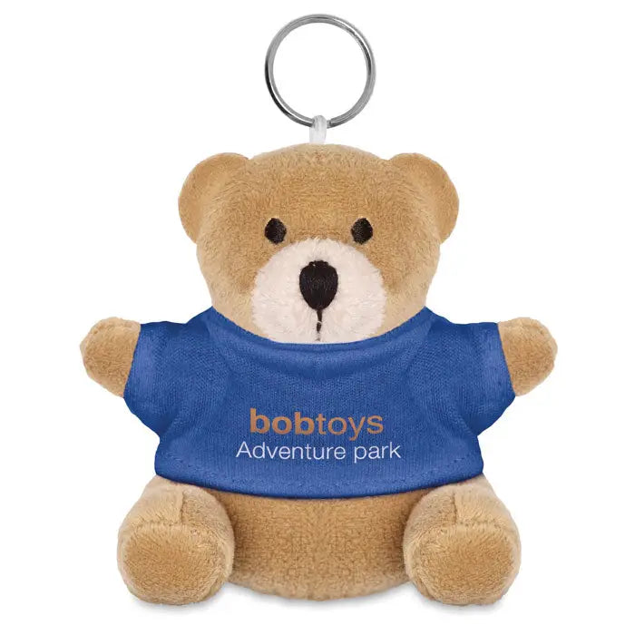 Breloc ursulet de plus tan colorat cu tricou albastru bobtoys adventure park atasat unei chei argintii