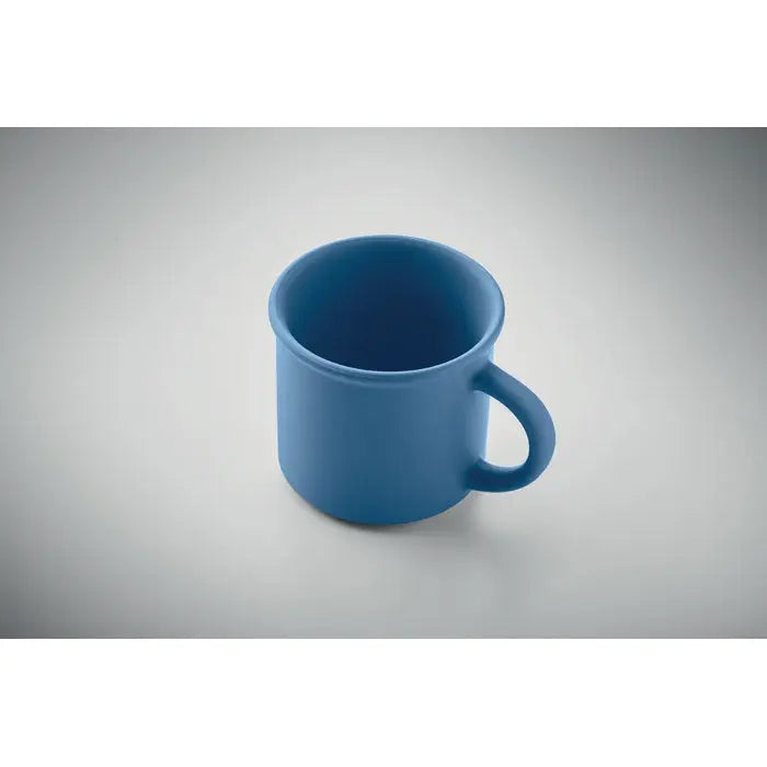 Cana din ceramica mata de culoare albastru solid cu maner rotund simplu si capacitate de 300 ml