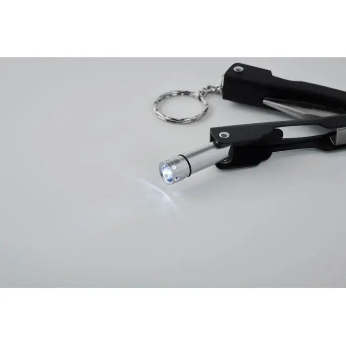 Lanternă compactă silver cu breloc negru, pliabilă cutit multifuncțional pentru portabilitate și utilitate