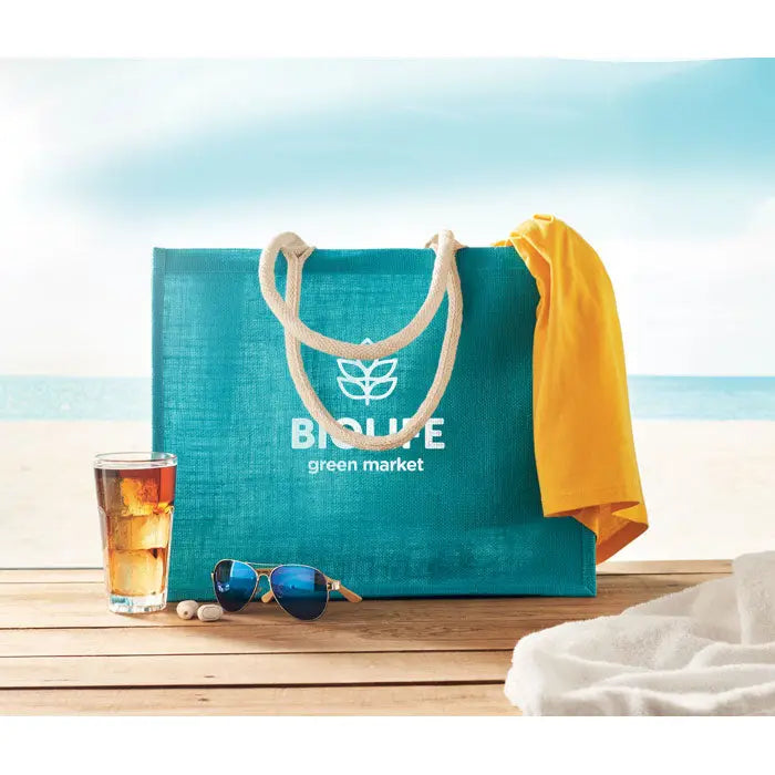 Geanta din iuta teal cu maner din bumbac crem si logo alb bio life green market