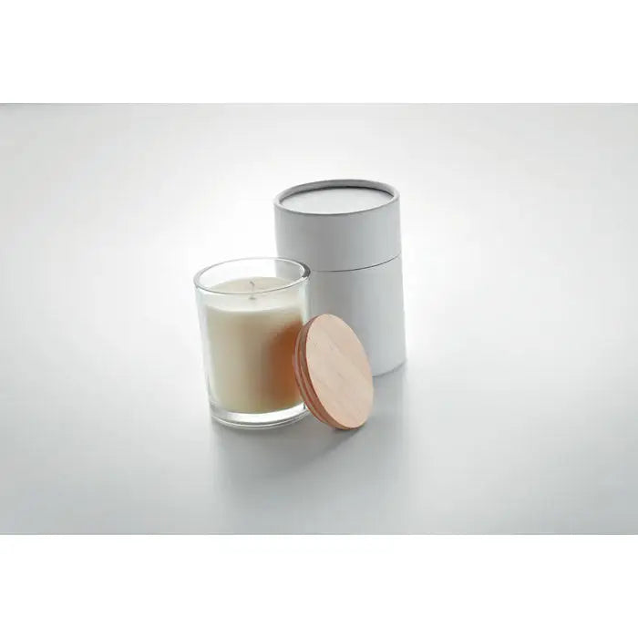 Lumanare cu parfum de vanilie crema in borcan de sticla cu capac de lemn si ambalaj cilindric minimalist