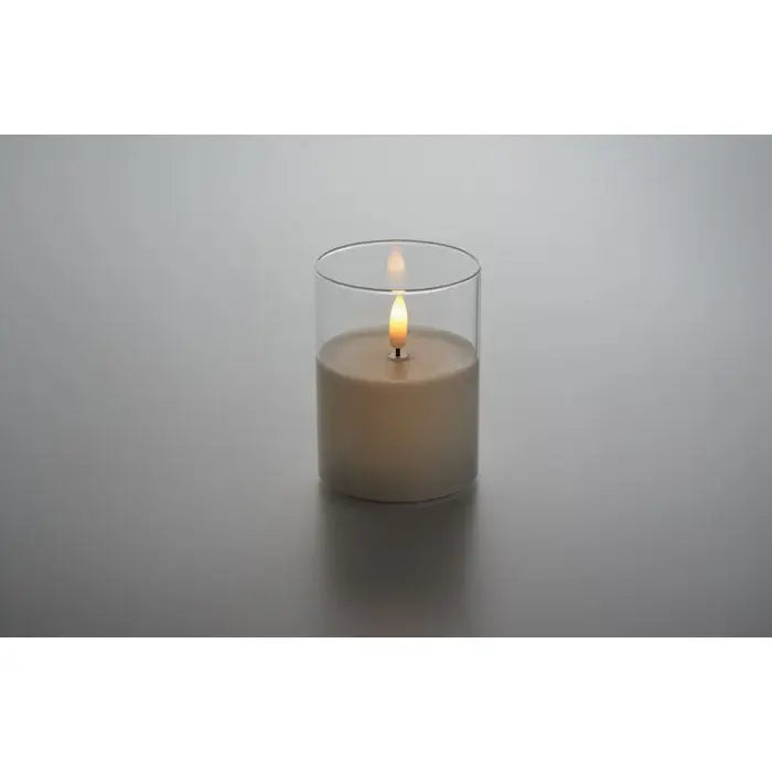 Lumanare led de ceara off-white aprinsa in suport transparent din sticla