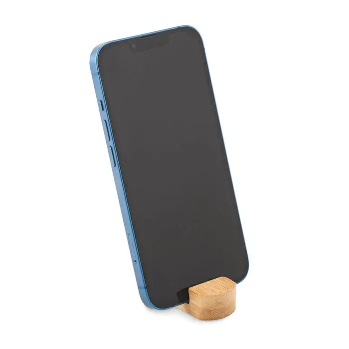 Mini suport pentru telefon din bambus cu smartphone albastru sprijinit pe suport din lemn deschis la culoare