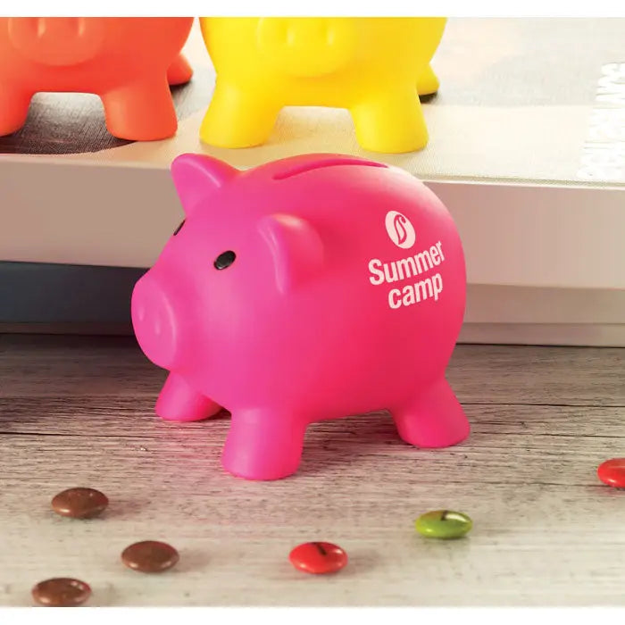 Pusculita piggy bank din plastic roz cu logo alb summer camp si ochi negri
