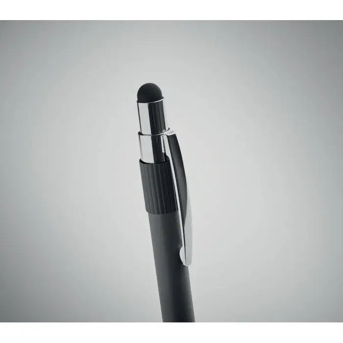 Stilou stilo spinner cu penita neagra, clip metalic argintiu si grip texturat pentru scris precis