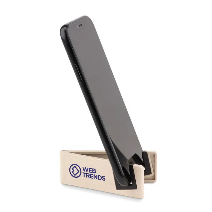 Suport telefon negru din fibra de bambus si PP cu logo web trends pe standul din lemn bej
