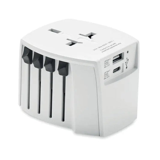 Adaptor skross muv usb a c alb cu porturi usb negre și sloturi de priză pentru mai multe țări