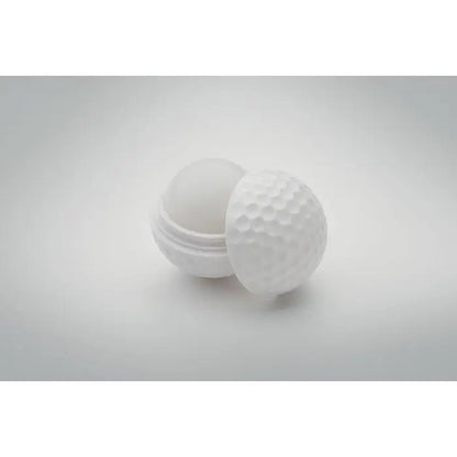 Balsam de buze alb în formă de minge de golf cu textură găurită și finisaj lucios neted