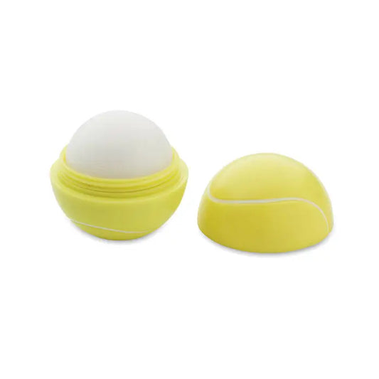 Balsam de buze in forma de minge de tenis galben cu produs alb sferic la interior