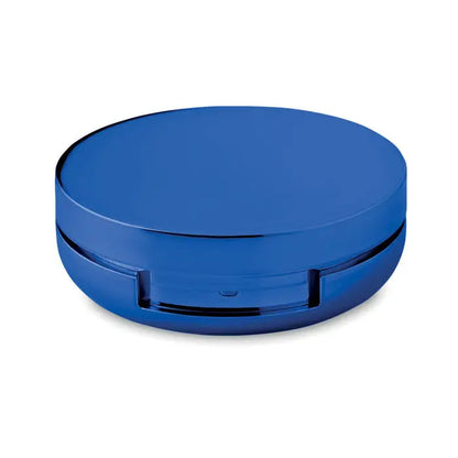 Balsam de buze în oglindă albastru metalic compact cu design circular și suprafață reflectorizantă netedă