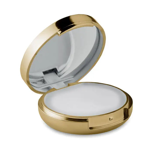 Balsam de buze în oglindă compactă aurie cu design rotunjit și interior oglindă pentru aplicare rapidă