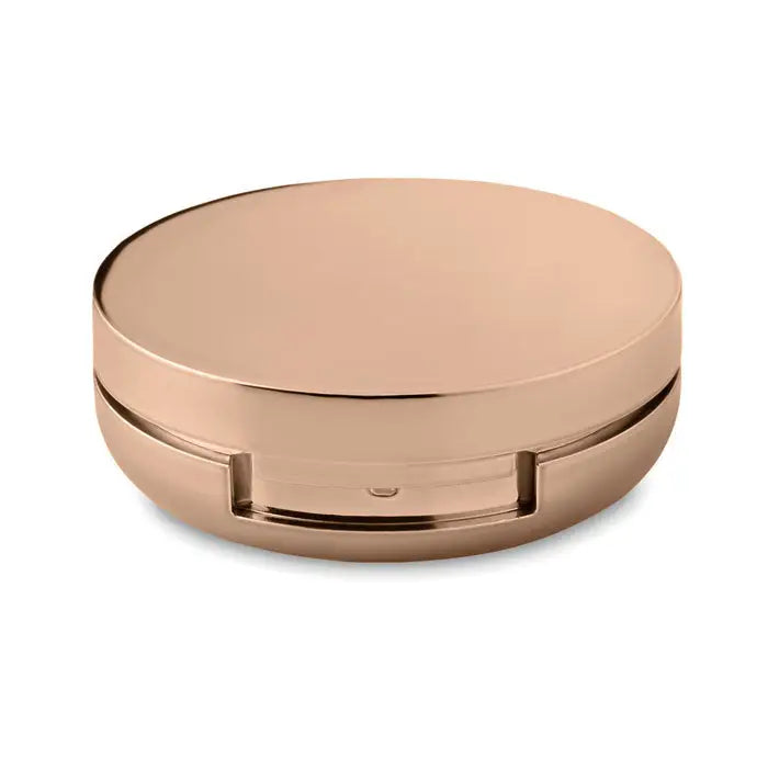 Balsam de buze in oglinda in ambalaj compact rotund rose gold cu finisaj metalic neted