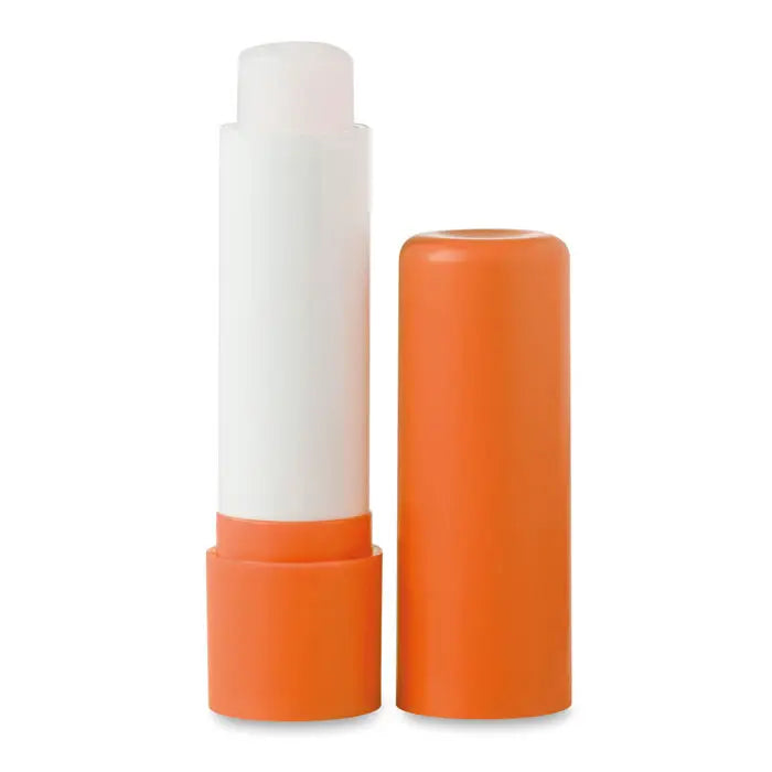 Balsam de buze în tub din plastic alb cu capac portocaliu pentru hidratarea buzelor