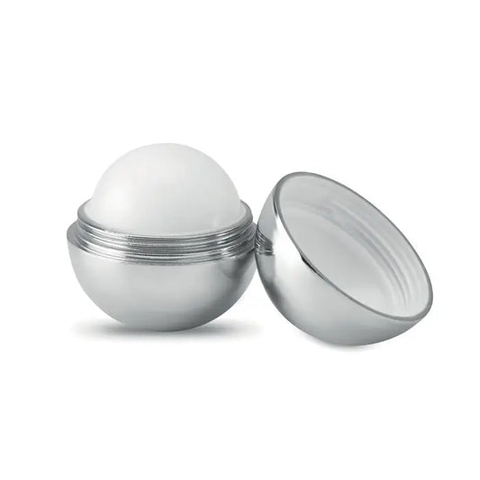 Balsam de buze rotund finisaj uv cu recipient sferic argintiu si bila alba cu textura fina