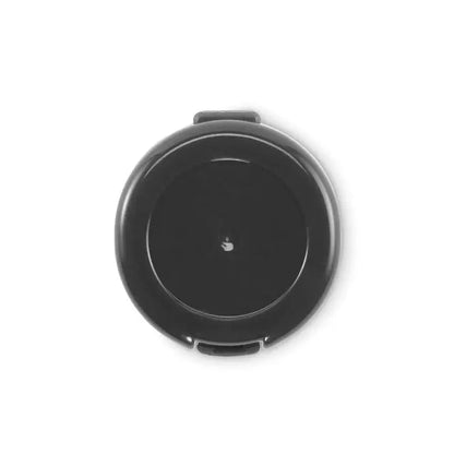 Balsam de buze vegan cu suport de incarcare wireless rotund negru si logo apple subtil in centru