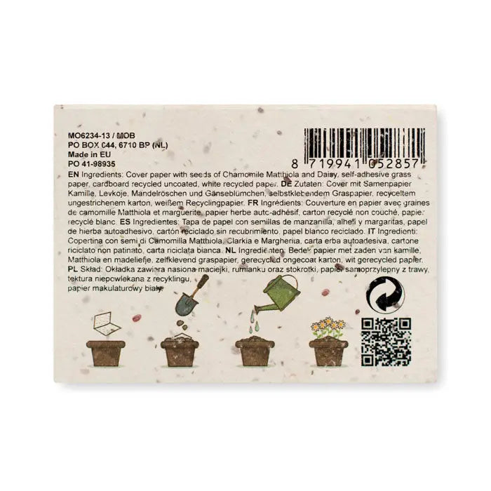 Bloc de note din hartie cu iarba cu autocolant alb din hartie reciclata ilustrand procesul de crestere al florilor