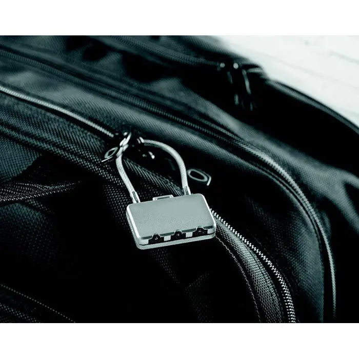 Blocare de securitate lacat argintiu din metal cu corp dreptunghiular si trei cadrane negre rotative