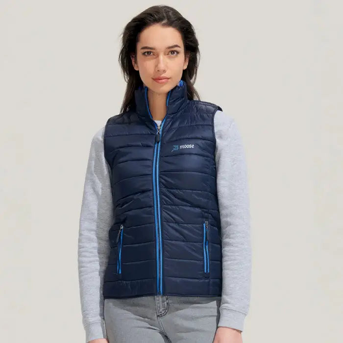 Bodywarmer femeie wave 180g vestă matlasată bleumarin cu fermoar și margini albastre vii din material puf