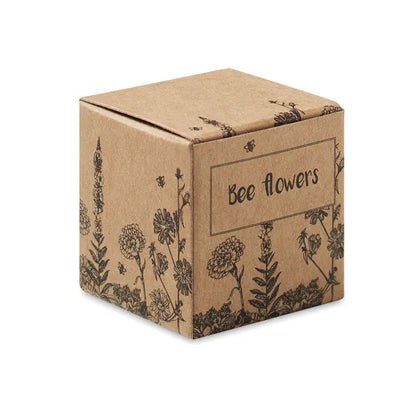 Cutie maro din carton cu ilustrații negre line-art de flori și albine etichetată bee flowers pentru bomba de semințe cu flori de albine