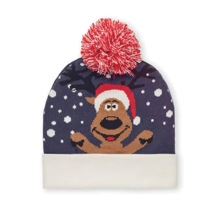 Bonita tricotata de craciun navy blue knitted beanie with a smiling brown reindeer wearing a red santa hat and white snowflakes