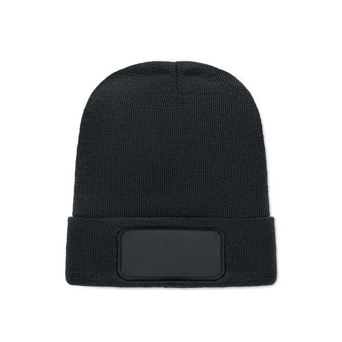Bonita unisex caciula neagra tricotata din poliester rpet cu maneca rabatabila si patch dreptunghiular pe fata
