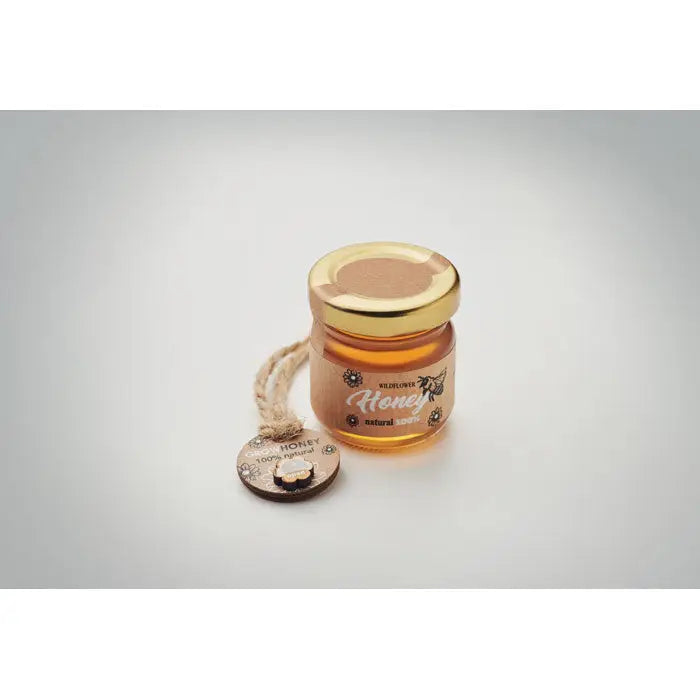 Borcan cu miere de flori salbatice 50 gr in sticla mica cu capac auriu si disc decorativ din lemn atasat cu snur