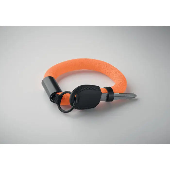 Breloc cu bratara plutitoare portocaliu stralucitor impletit cu clips negru din plastic si breloc metalic atasat