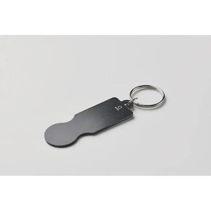 Breloc cu jeton pentru carucior negru mat cu forma ovala alungita si inel metalic argintiu sleek