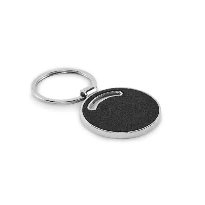 Breloc de forma rotunda din piele neagra cu margine metalica argintie si design curbat decupat
