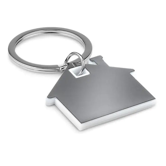 Breloc din plastic in forma de casa cu finisaj metalic argintiu si design minimalist simplu