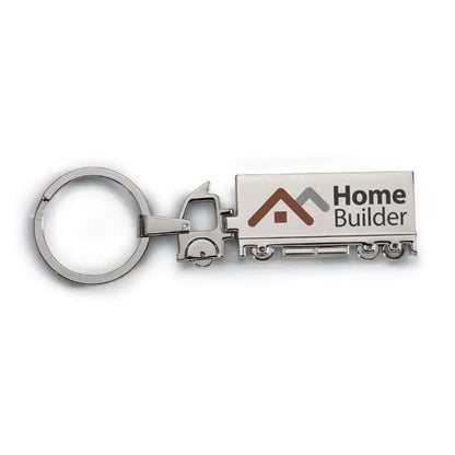 Breloc metalic argintiu sub forma de camion cu logo si branding home builder pe semiremorca
