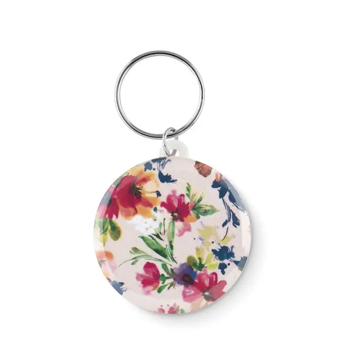 Breloc mic cu buton rotund cu design floral acuarelă colorat și frunze verzi pe fundal deschis