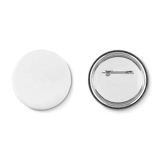 Butonul Fixati arată spatele unui buton circular alb cu ace metalic pentru fixare