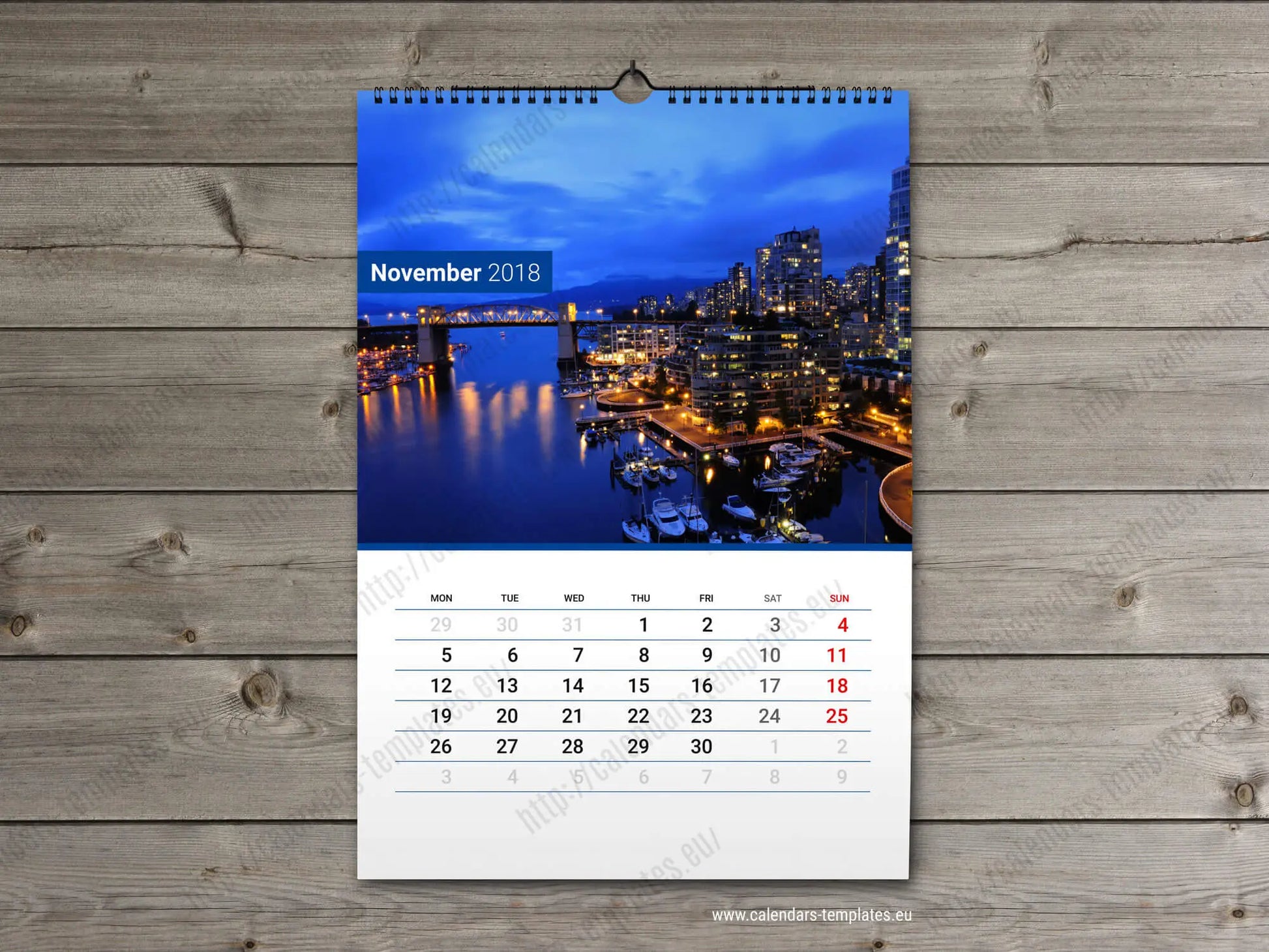 Calendar a3 12 file noiembrie 2018 cu peisaj urban albastru vibrant si clădiri iluminate reflectate pe apă