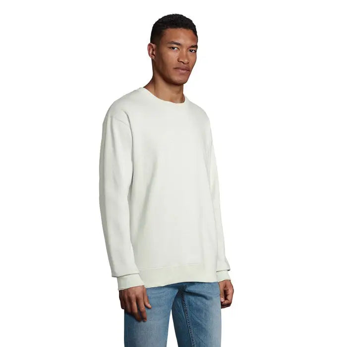 Bluză unisex columbia de culoare alb-crem, mâneci lungi, guler rotund și manșete refiletate, croială lejeră