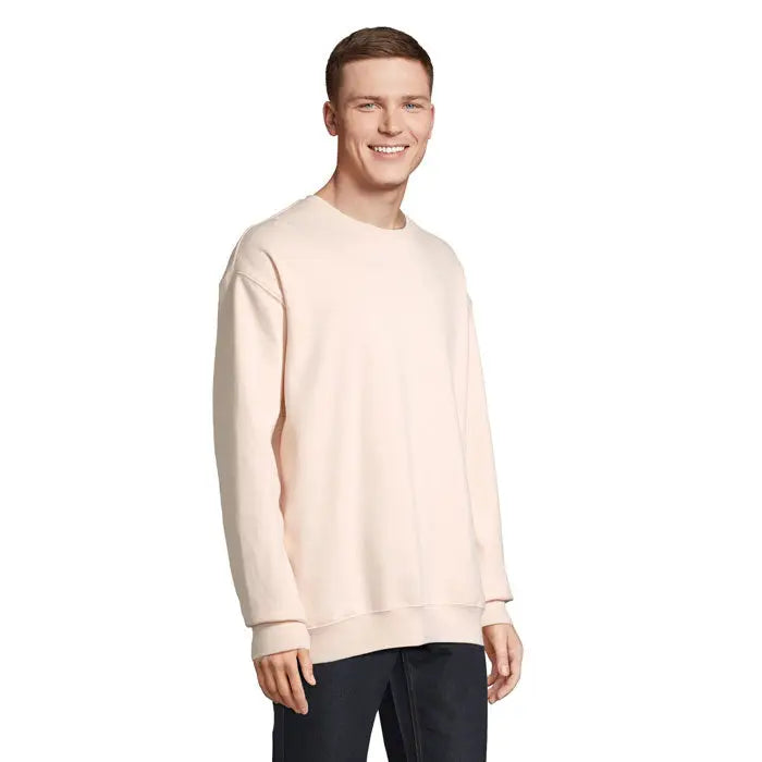 Bluză unisex columbia roz pal cu mâneci lungi, croială lejeră și mâneci striate din material moale