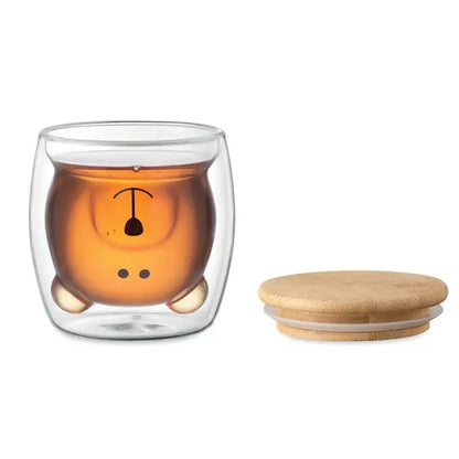 Cana din borosilicat cu perete dublu transparent cu design ursulet si lichid de culoare chihlimbar