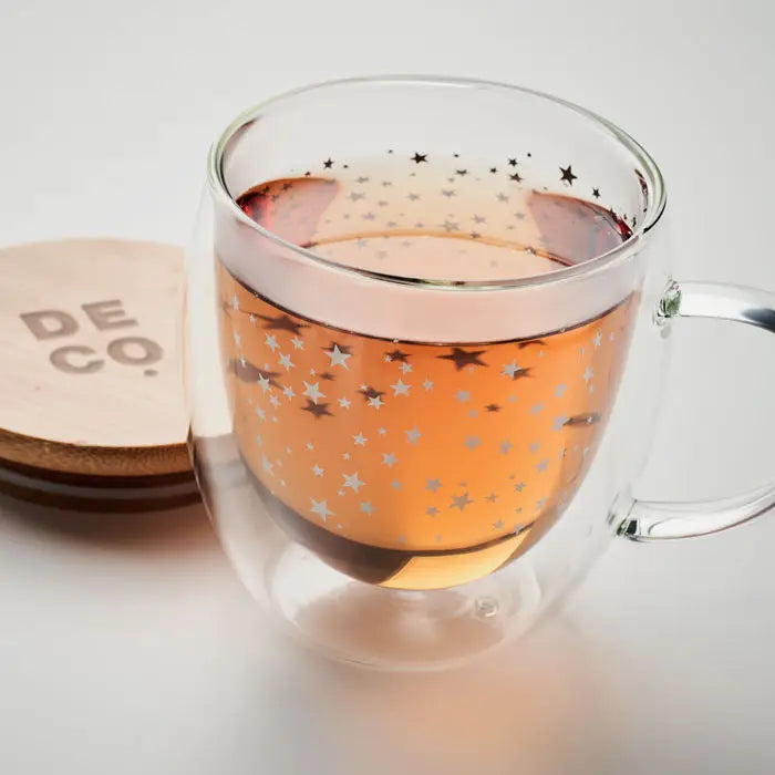 Cana din borosilicat cu perete dublu transparenta cu interior portocaliu si decoratiuni stelute argintii