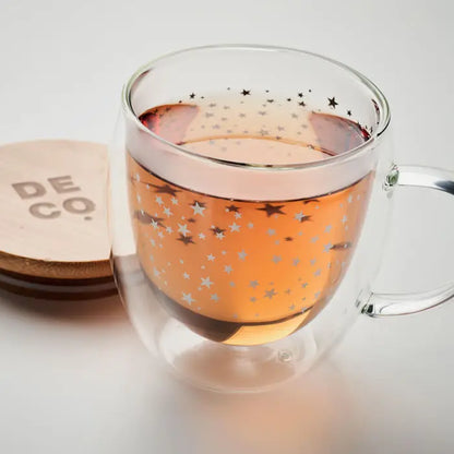 Cana din borosilicat cu perete dublu transparenta cu interior portocaliu si decoratiuni stelute argintii