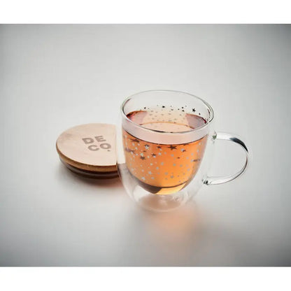 Cana din borosilicat cu perete dublu transparenta cu stele aurii si capac de lemn gravat deco