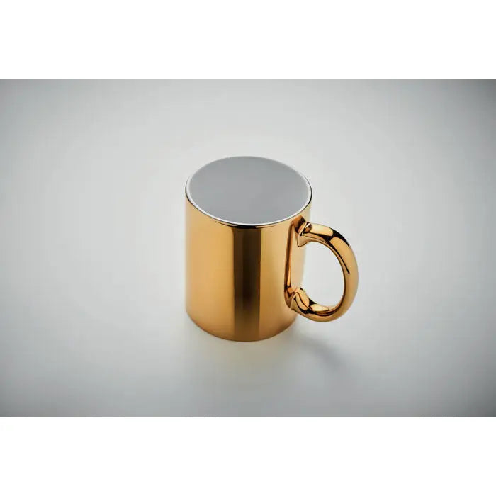 Cana din ceramica metalica 300 ml aurie cu finisaj reflectorizant si toarta asortata