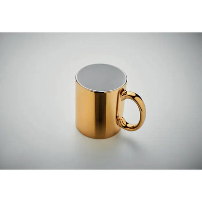 Cana din ceramica metalica 300 ml aurie cu finisaj reflectorizant si toarta asortata