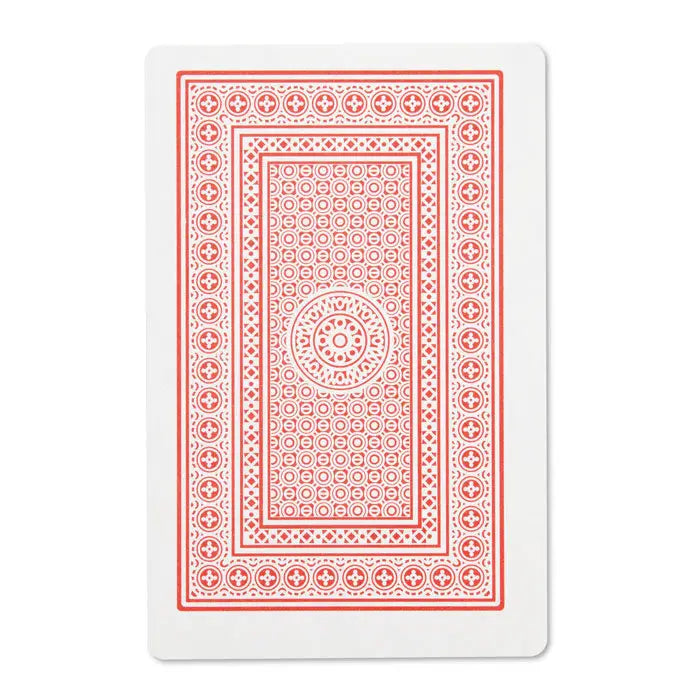 Un card de joc alb cu model geometric roșu circular pe spate în cutie de tablă