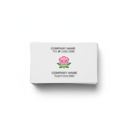 Cărți de vizită carton special personalizate, vedere de sus, fundal alb, logo floral vizibil, design CMYK roz-verde, format 85×55mm – AndorTipo