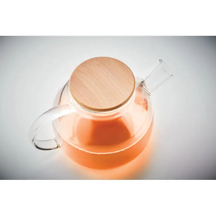 Ceainic din sticla borosilicata 850ml cu capac si maner din bambus, plin cu ceai portocaliu