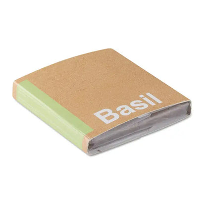 Notepad stil pluta maro cu coperta verde deschis si inscriptie alba busuioc pentru compost cu seminte busuocol