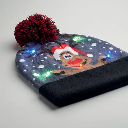 Beanie craciun tricotat led gri cu ren zâmbitor în căciulă de moș crăciun, fulgi de zăpadă și ciucure roșu plusat