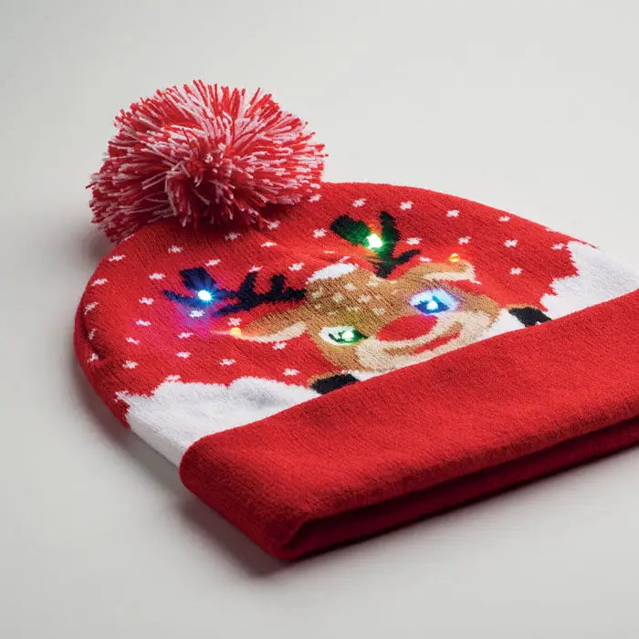 Craciun tricotat beanie led rosu cu fata de ren luminata, model fulgi de nea si pompon rosu din material tricotat